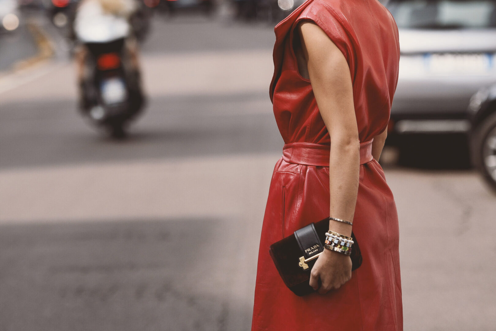 September 23, 2018: Milan, Italy - Girl with a luxury Prada handbag - street stule outfit during Milan Fashion Week  - MFWSS19